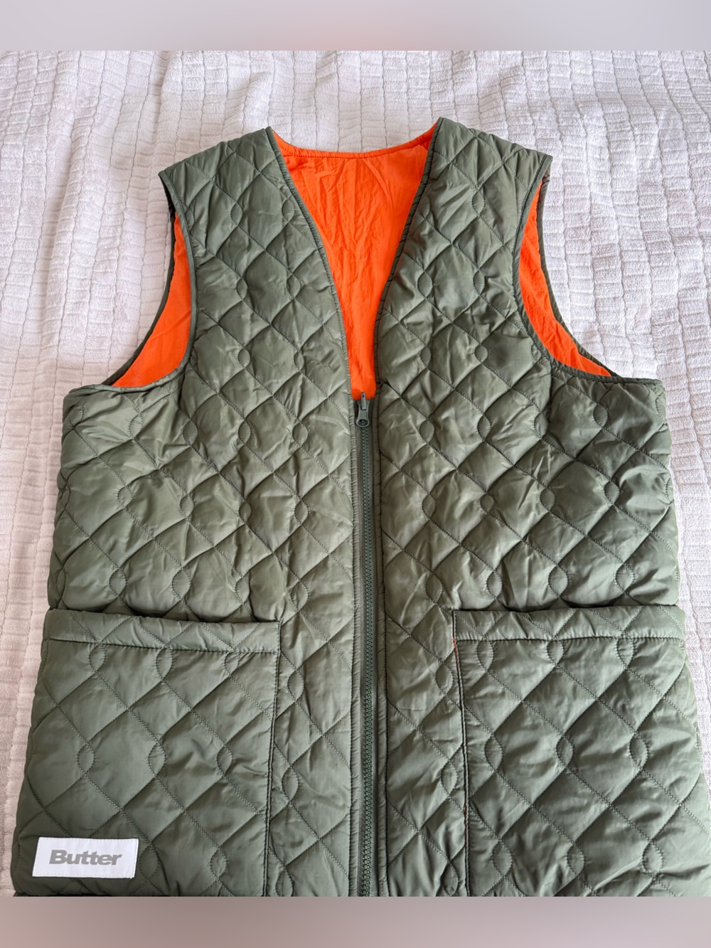 Butter Quilted Reversible Vest in Olive Green and Orange